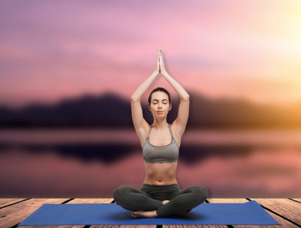 Frau macht Yoga-Übung